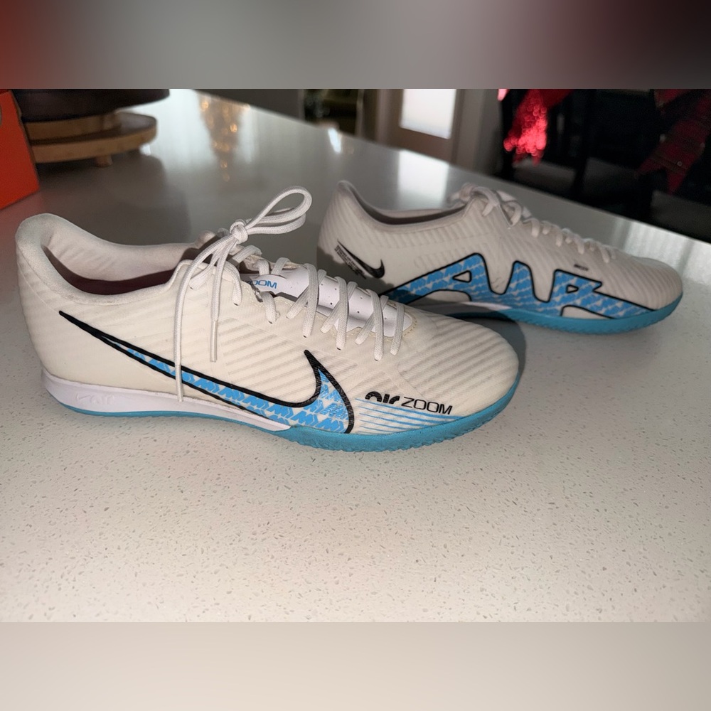 Women’s Nike Zoom Mercurial Vapor 15 indoor soccer shoes. White, Blue Accents